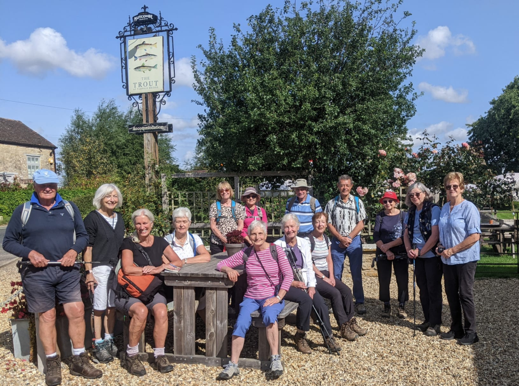 The Retired Pharmacists Group sat outside in the sunshine by a pub